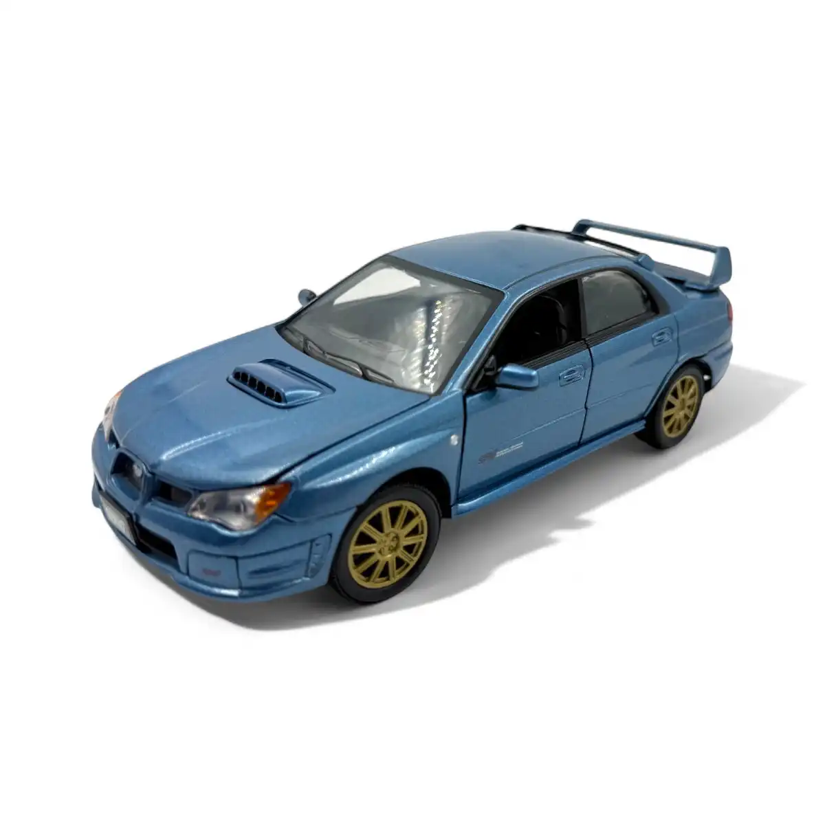 74330DAZSubaru Subaru Impreza WRX STI 2006 Motor Max 1/24 Sin Caja